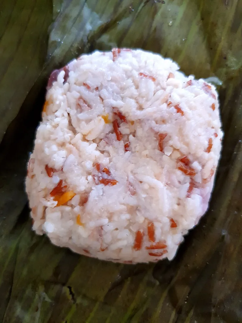 Linopot or linopod (steamed rice and yam in banana leaf) is a traditional Dusun food from Sabah